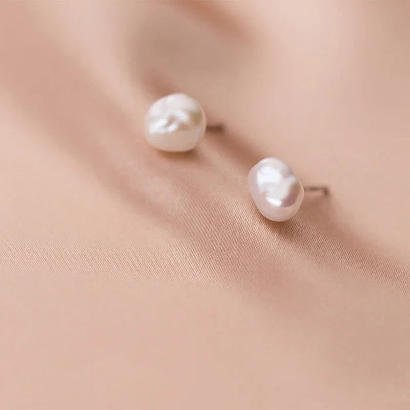 Luxury snow stud earrings